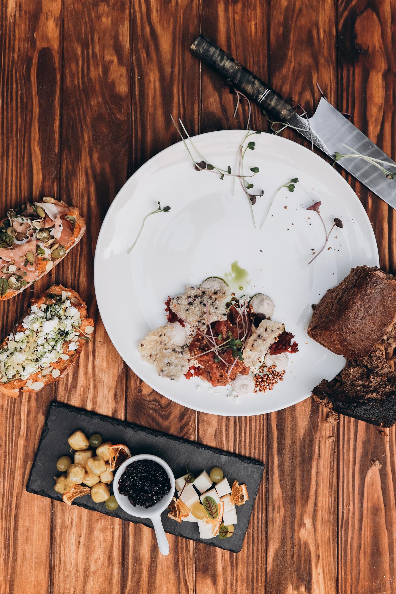 large editorial shot of plated tasting menu